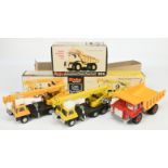 Dink Toys Group of 3 - (10 924 Aveling-Barford Centaur Dumper - Red including hubs with Deep Yell...