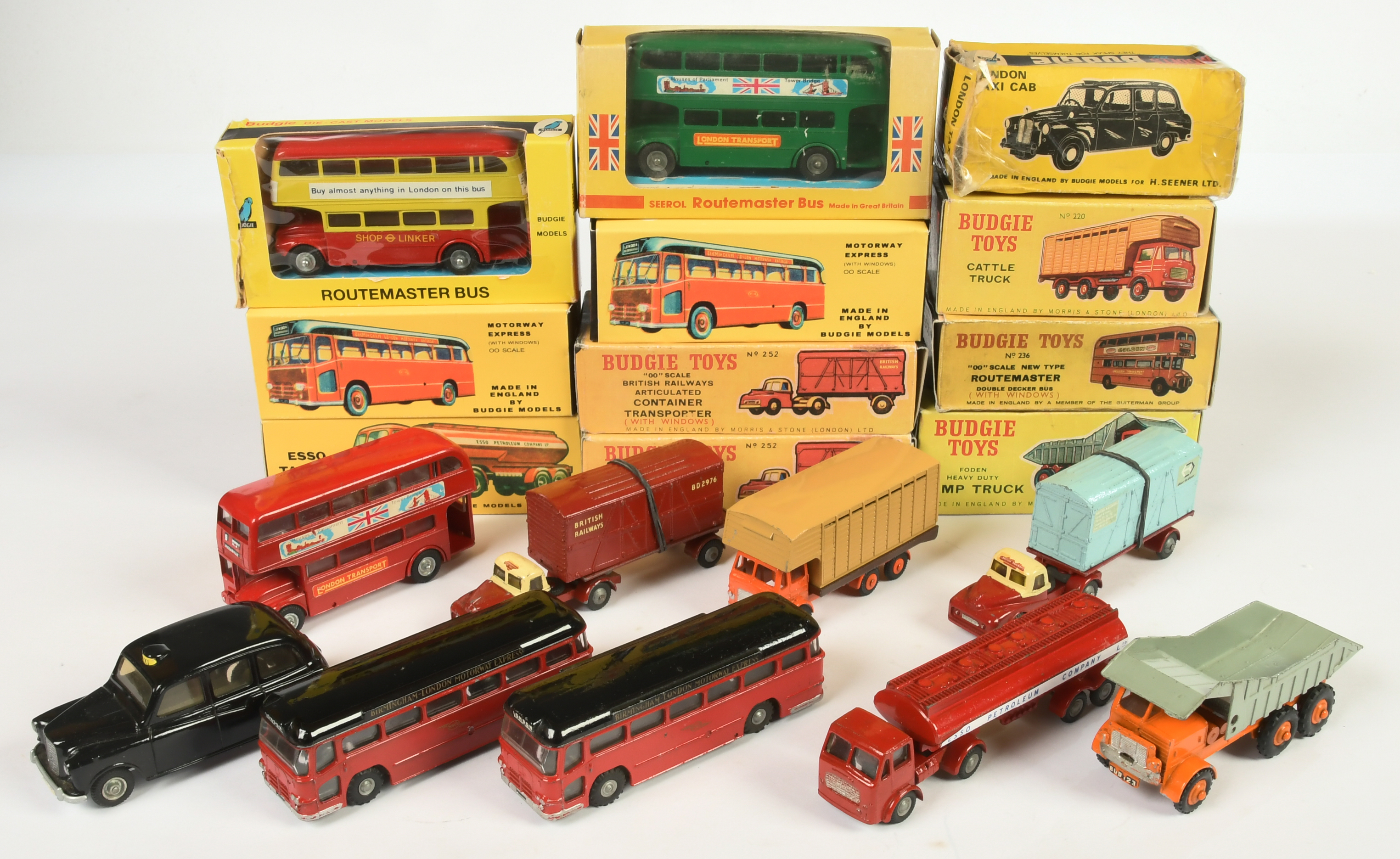 Budgie Toys Group To include "Esso" Articulated Tanker, "London Transport" Routemaster bus, Tippe...