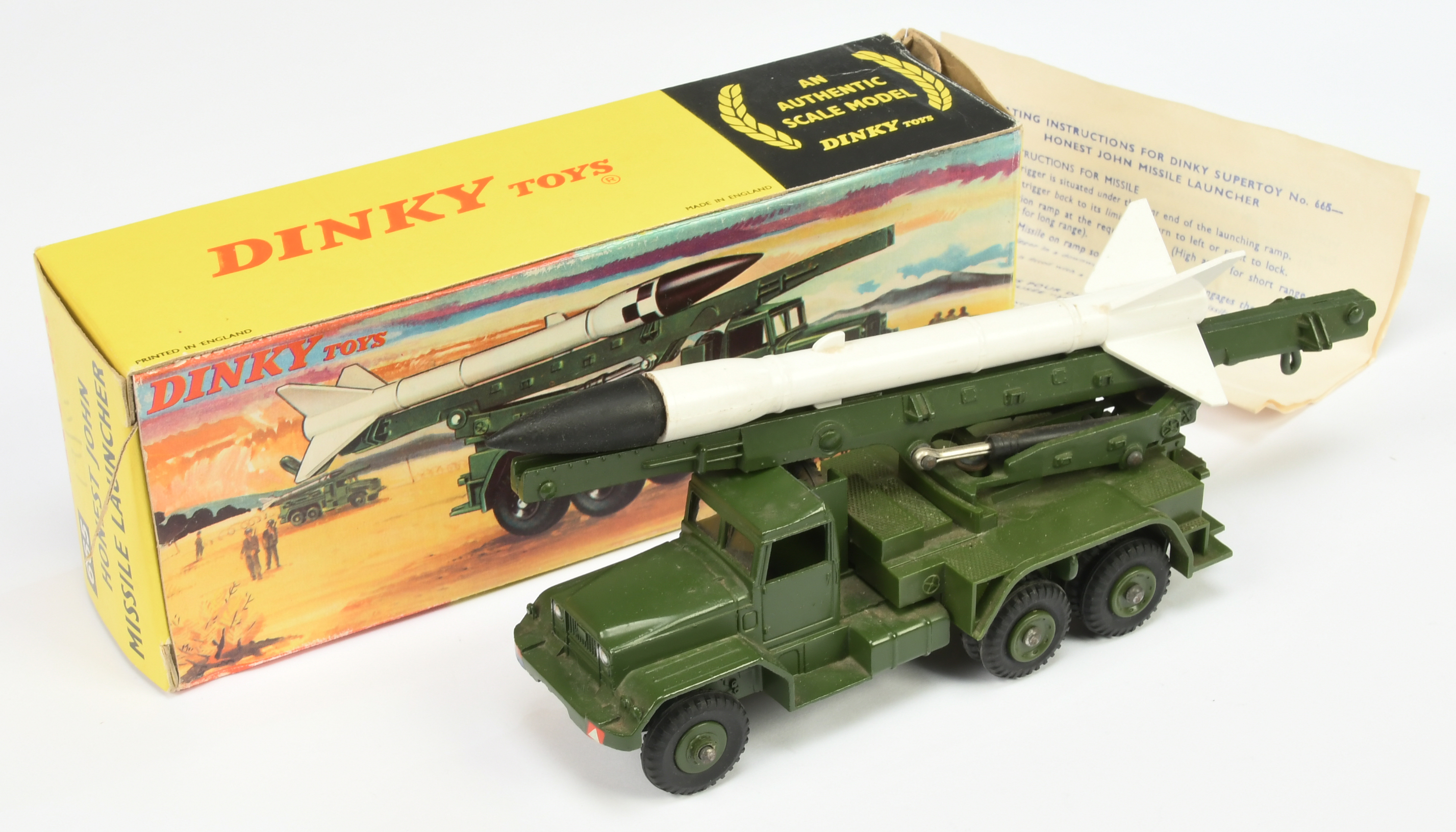 Dinky Toys Military 667 Honest John Missile Launcher - Green including plastic hubs with white an...