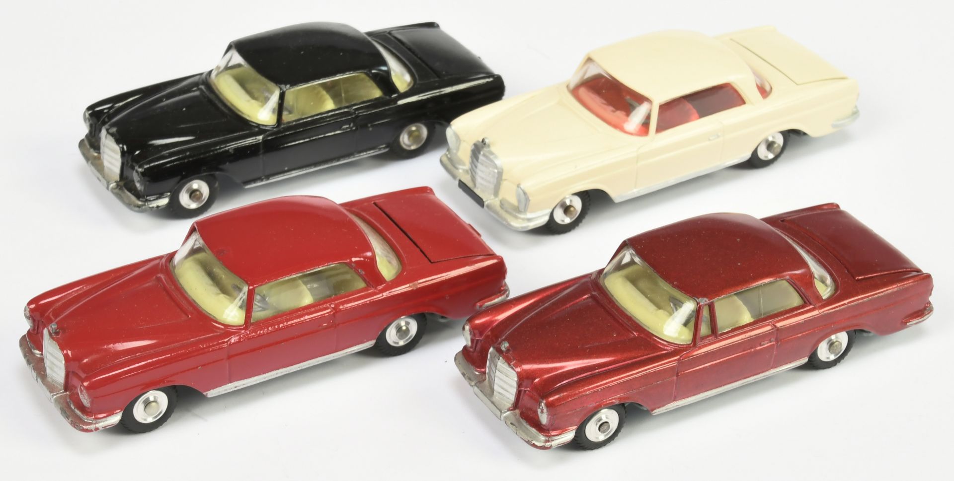 Corgi Toys Unboxed Group Of 4 Mercedes 220SE Coupe   To Include - (1) Cream, red interior, (2) Bl...