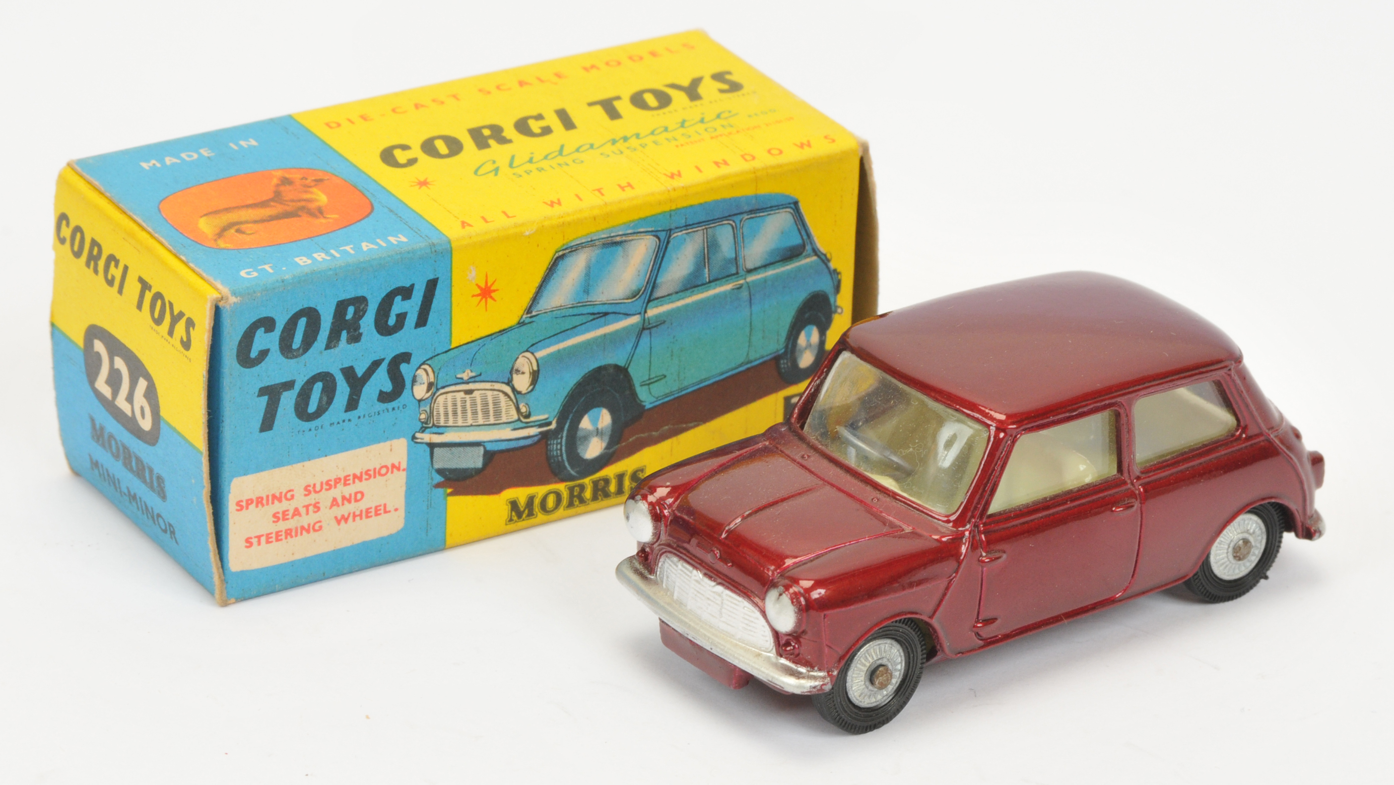 Corgi Toys 226 Morris Mini Minor - Metallic maroon, lemon interior, silver trim and cast hubs