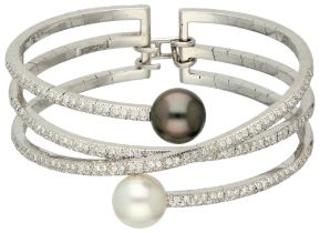 Stefan Hafner 18K white gold crossover bracelet set with diamond, South Sea and Tahiti pearl.