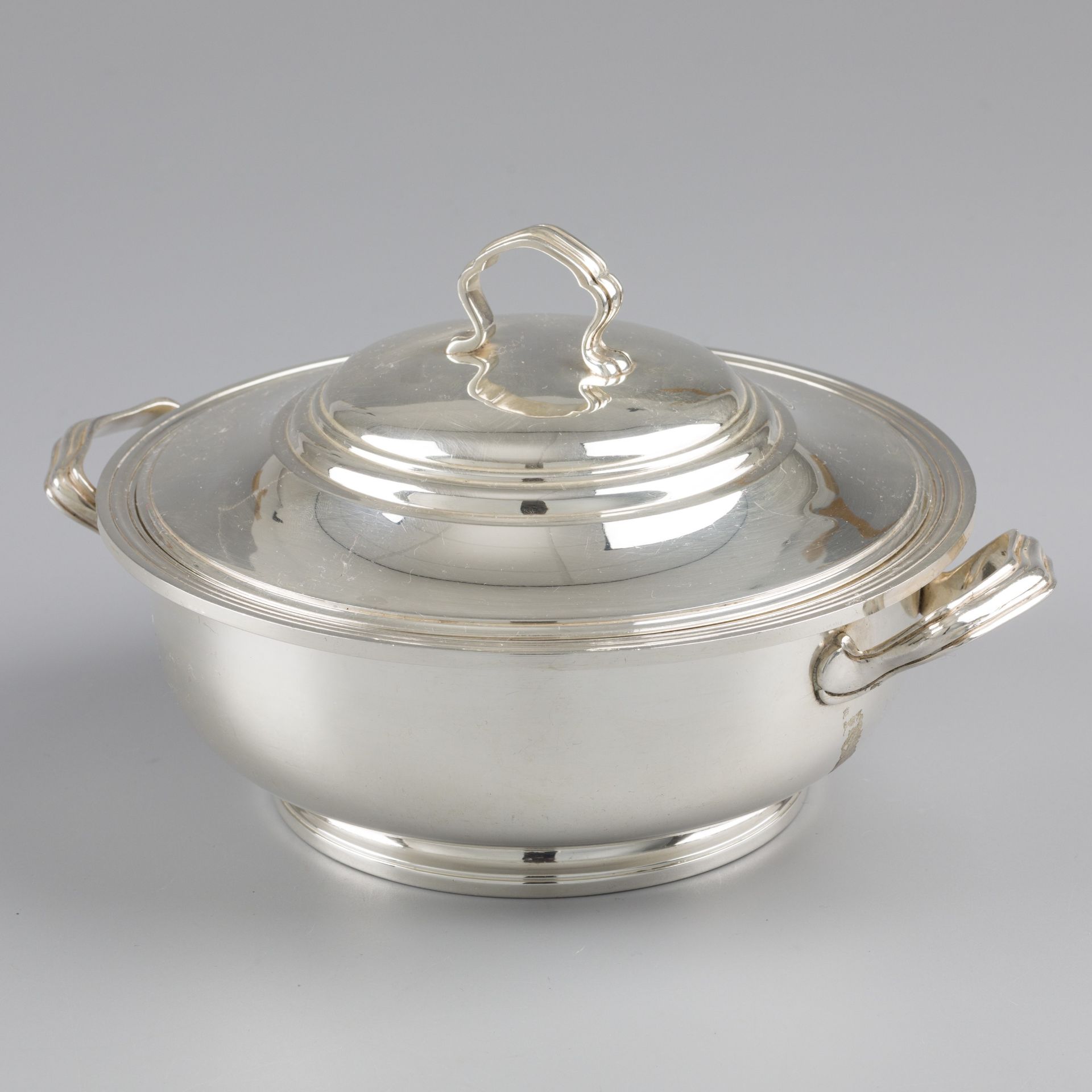 Covered serving dish silver.