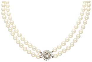 Two-row Akoya pearl necklace with 18K white gold closure set with approx. 1.04 ct. diamonds.