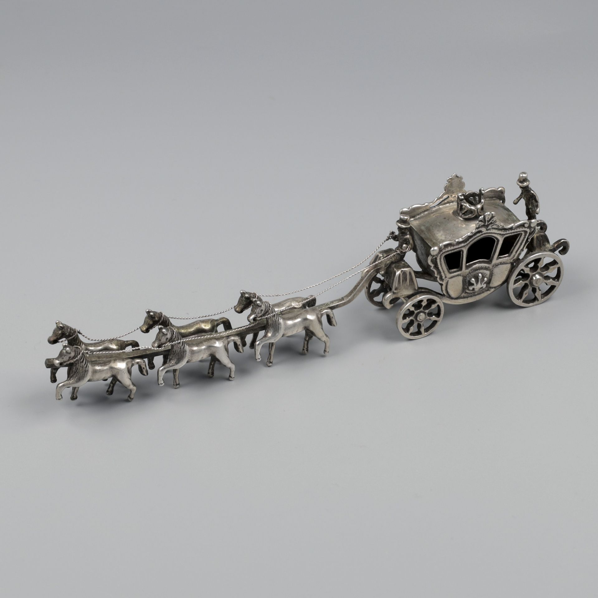 Miniature royal carriage silver.