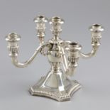 Four-armed candlestick silver.