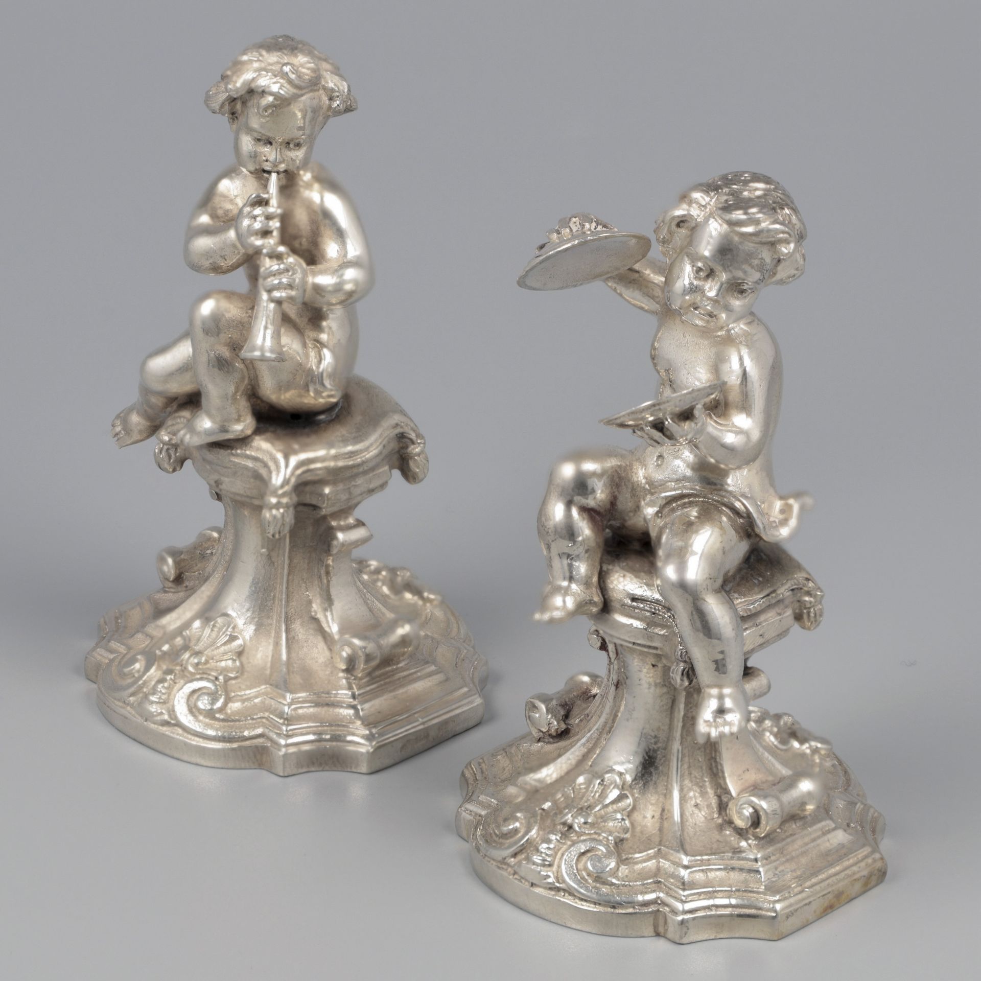 Tablepiece Putti figurines silver.