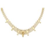 14K Yellow gold Milanese link necklace.