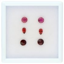 No Reserve - Lot of six gemstones consisting of natural ruby, garnet and red glass stones.