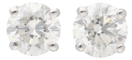 No Reserve - 18K White gold certified solitaire stud earrings set with approx. 2 ct. diamonds.