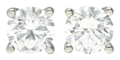 No Reserve - GIA certified 18K white gold solitaire ear studs with 1.00 ct. diamond.