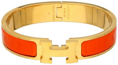 No Reserve - Hermès 'CLIC H' bracelet with orange enamel.