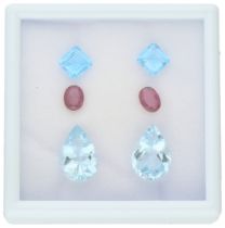 No Reserve - Lot consisting of six natural gemstones consisting of ruby, aquamarine and sky blue top