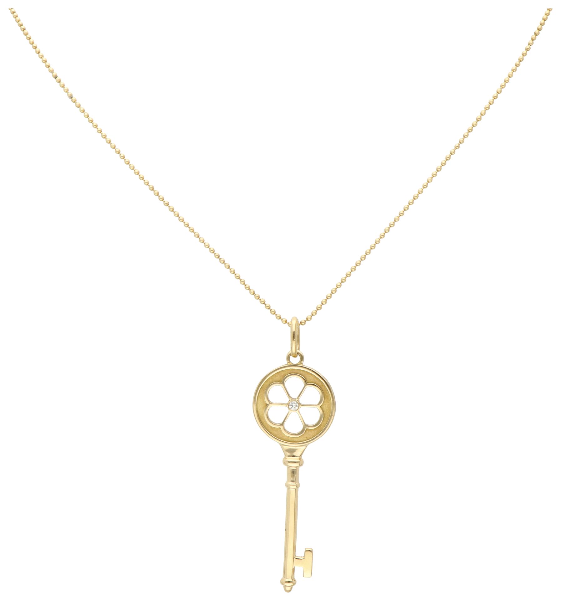 No Reserve - Tiffany & Co 18K yellow gold 'Blossom flower' key pendant with necklace.