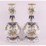 A pair of earthenware so-called 'knob vases', France.