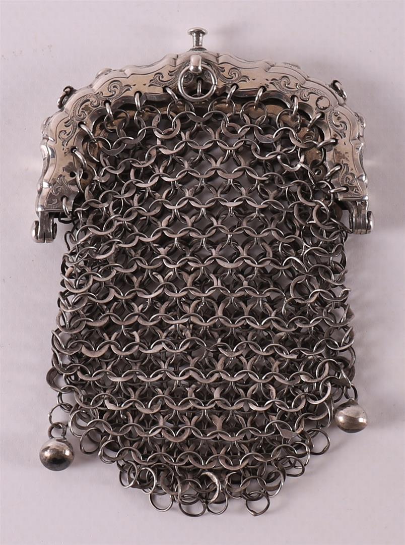 A second grade silver purse with mailers, year letter 1883.