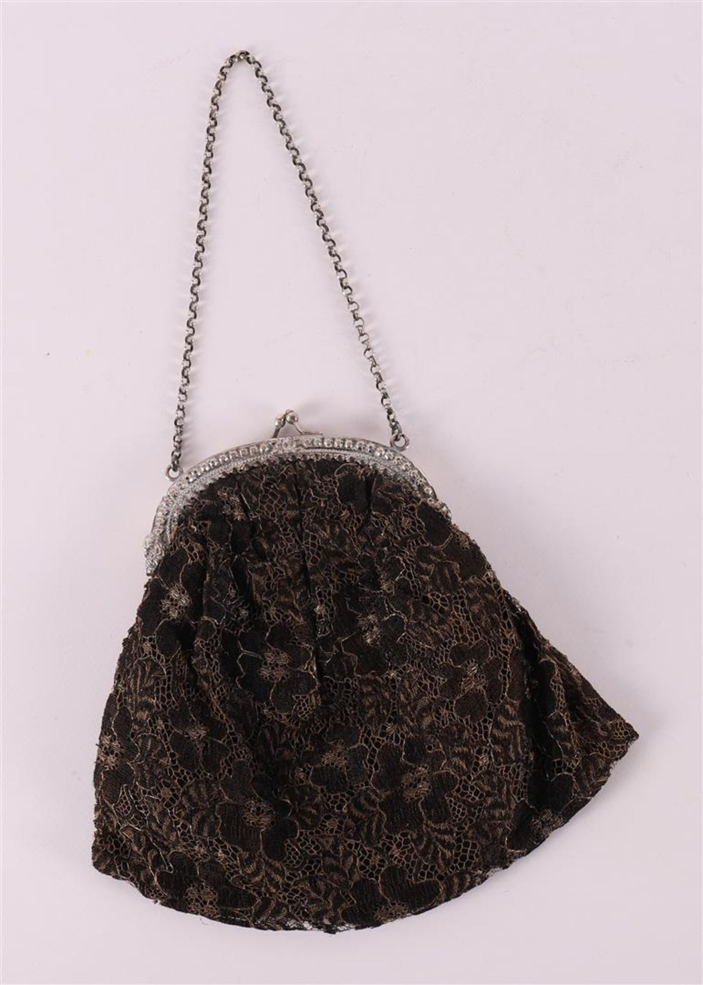 A second grade 835/1000 silver bag bracket on a fabric bag, 19th century