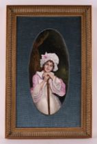 An oval porcelain plaque depicting a young woman, Germany