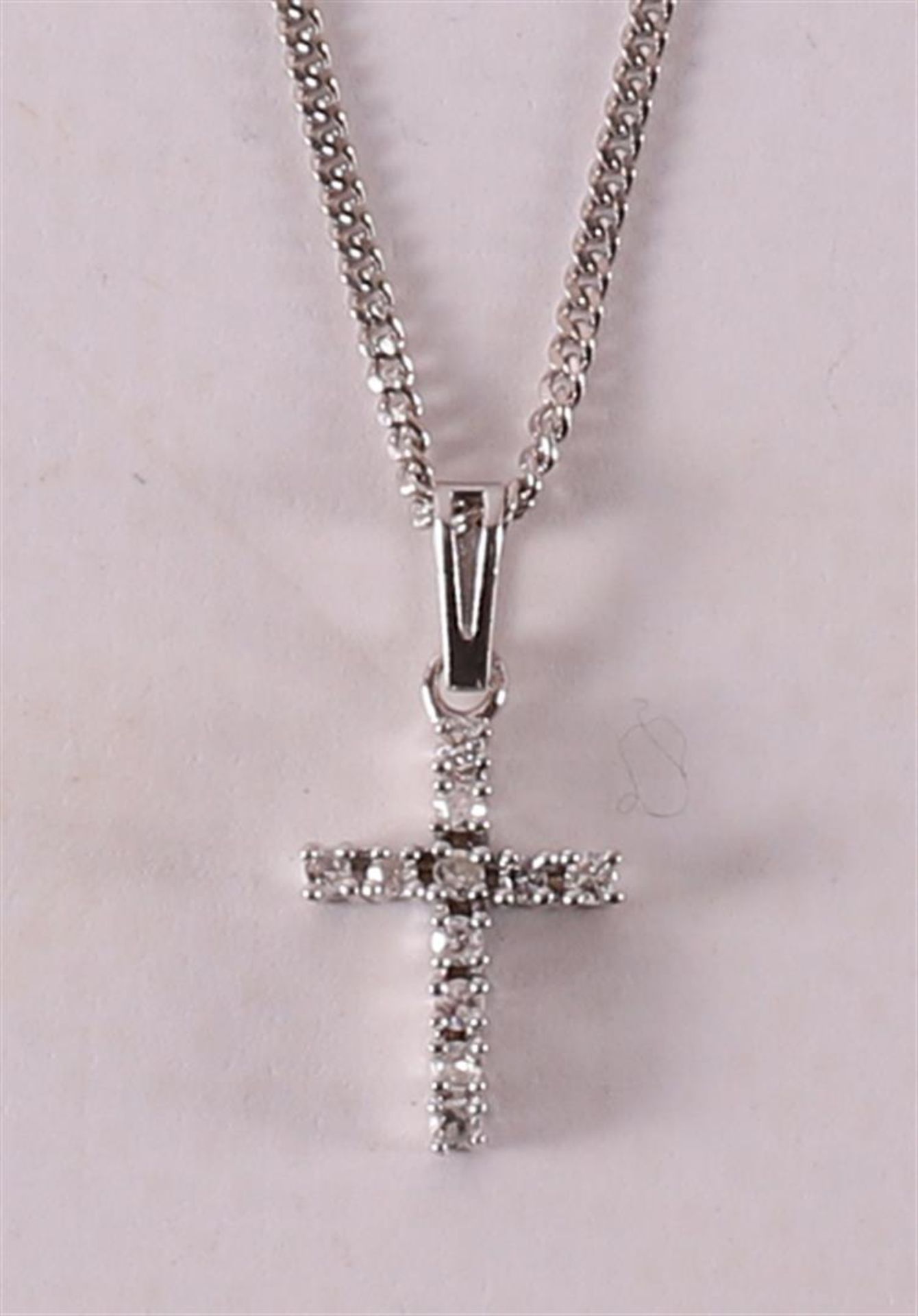 A 14 kt white gold necklace and cross with 11 diamonds. - Image 2 of 2