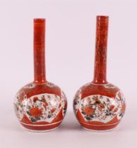 A pair of polychrome decorated porcelain conical bottles, Japan, Kutani, Meiji,