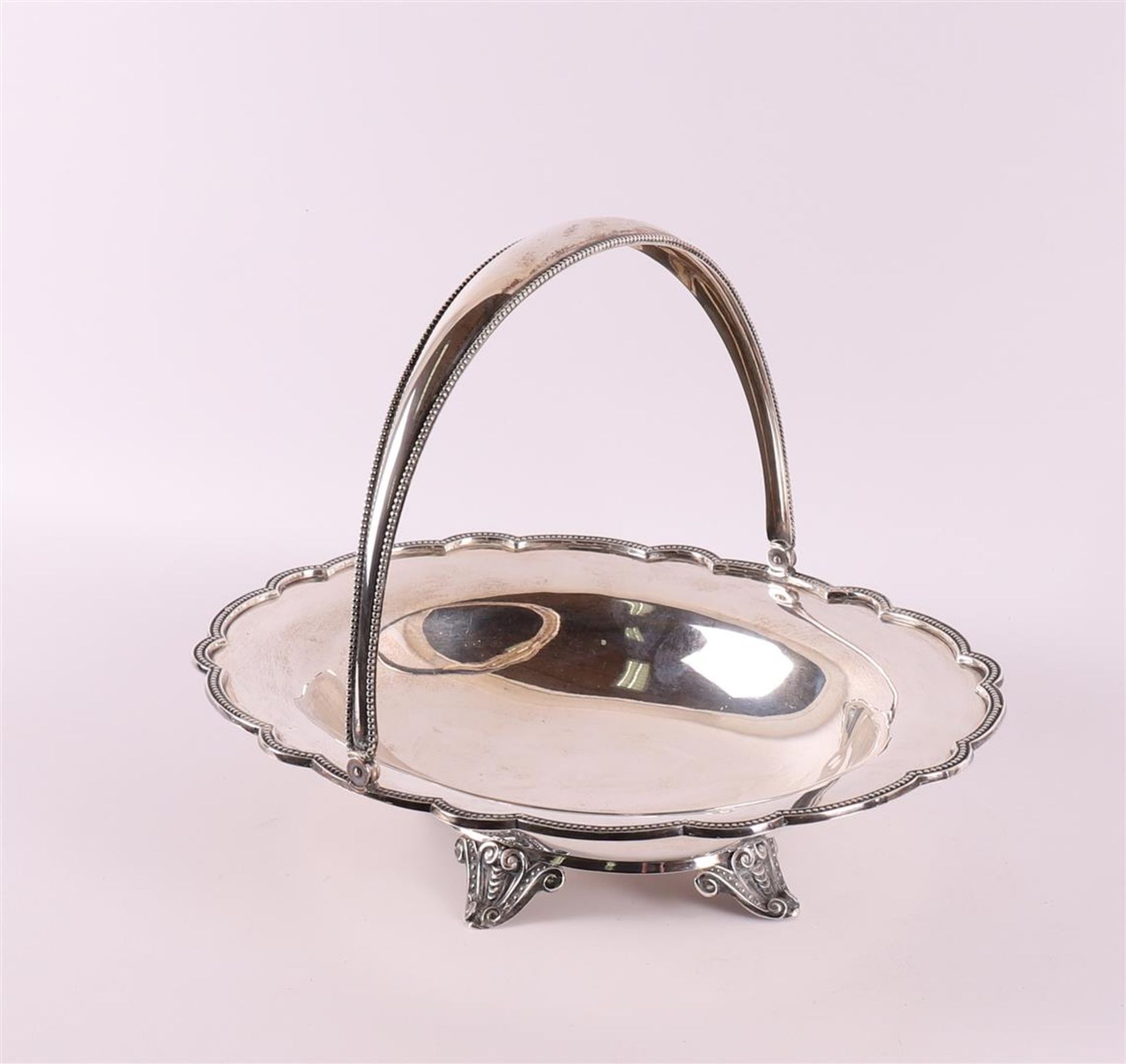 An oval second grade 835/1000 silver handle bowl, around 1900.