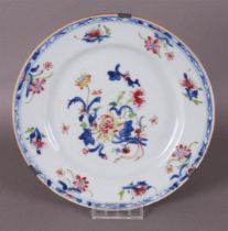A porcelain famille rose plate, China, Qianlong, 18th century.