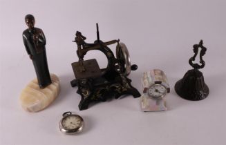 A lot of miscellaneous items, including a miniature sewing machine, silver vest