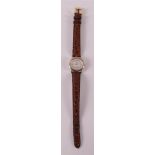 A ladies wristwatch with leather strap. Omega - De Ville, steel/gold, quartz,