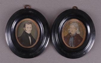 A pair of oval miniature portraits in an ebonized frame, Groningen/Friesland