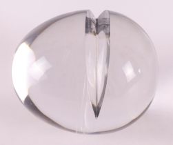 A clear glass design egg with incision, signed on the bottom 'T.H. Riha'