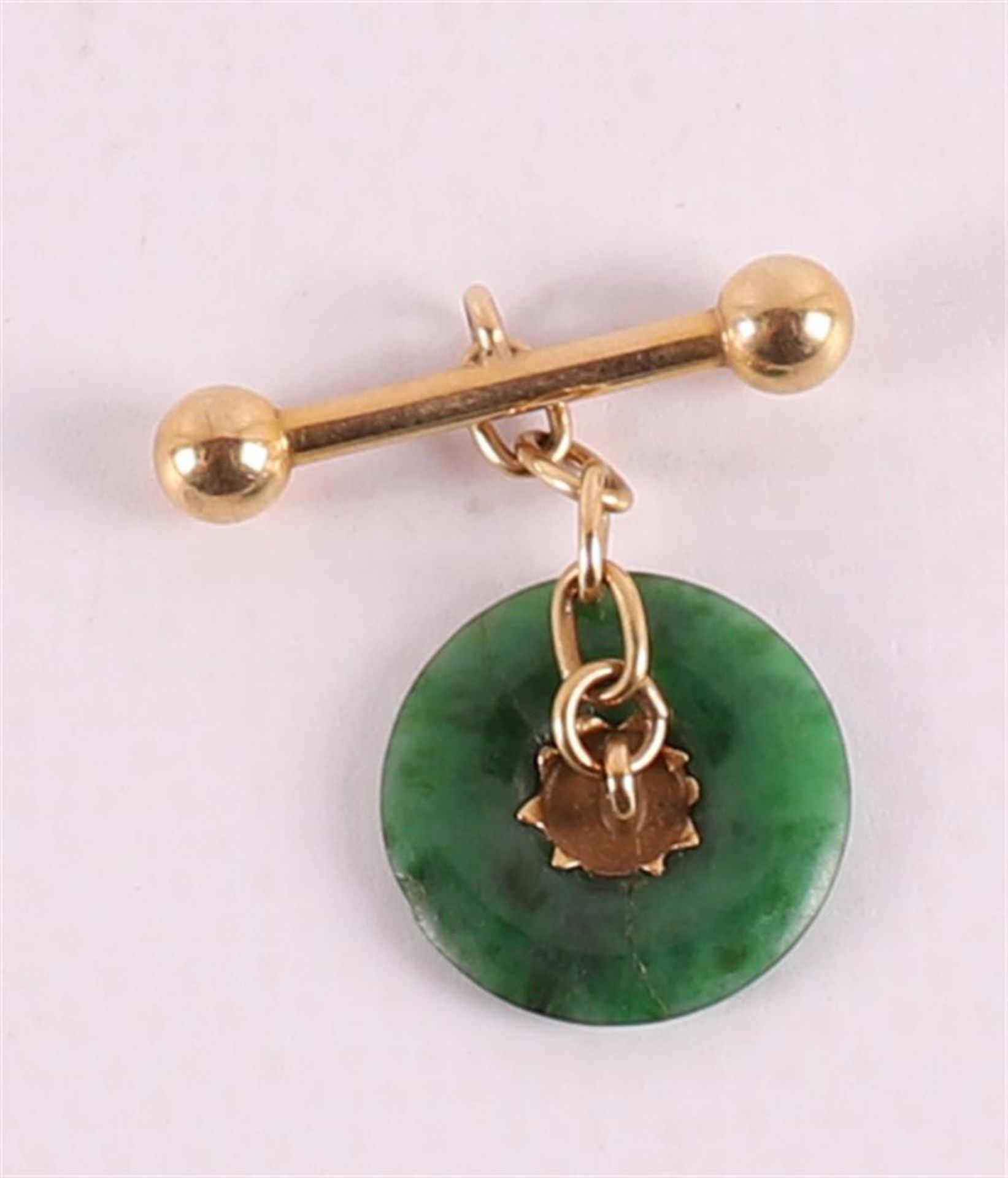 A pair of gold cufflinks with green jade discs. - Image 3 of 3