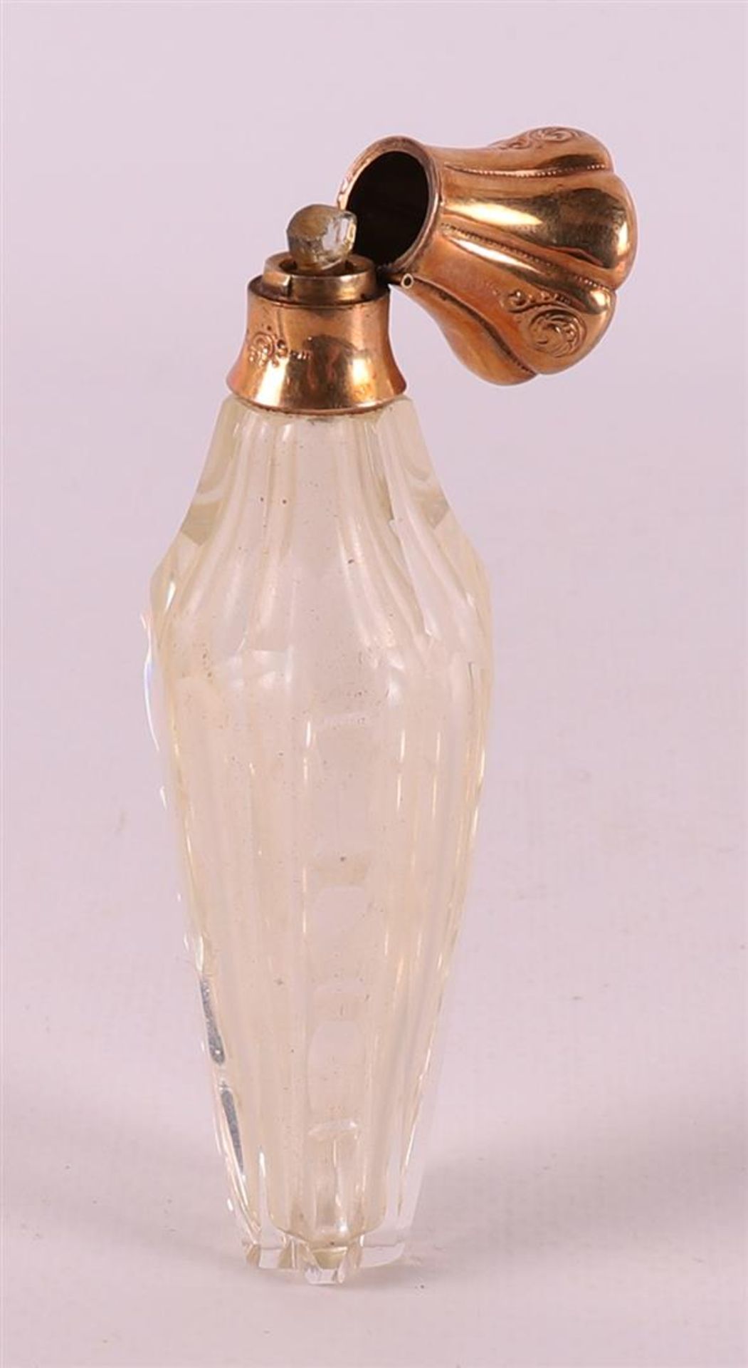 A clear crystal odor flask with gold lid, 19th century. - Image 3 of 4