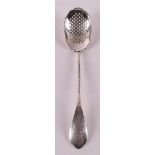A second grade silver sugar spoon with twisted handle and floral decor.