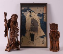A lot of Asian art, including carved wooden sculptures and Japanese woodcuts.