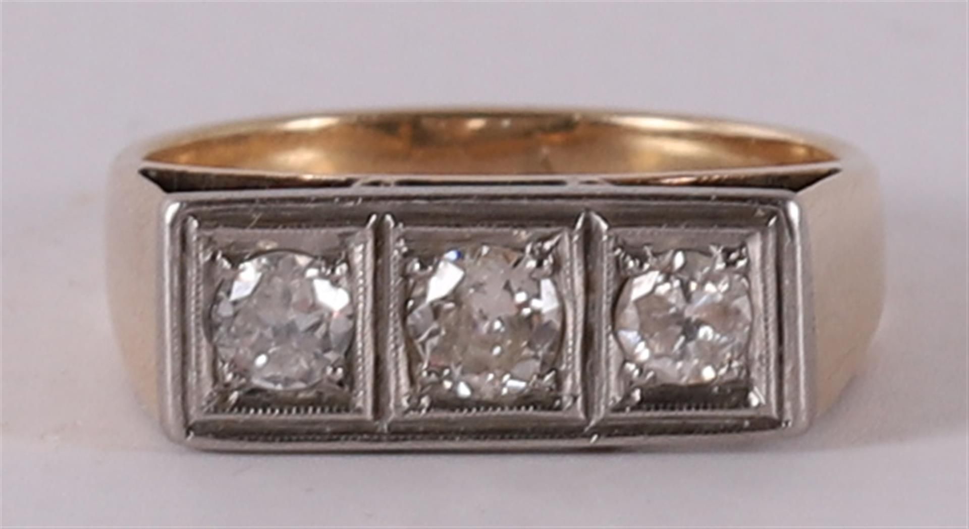A 14 kt gold vintage men's ring with 3 diamonds.