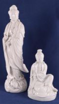 A blank Chinese standing kwanyin on waves with lotus, China 19th/20th century