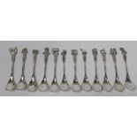 Twelve silver teaspoons, the stems with the theme 'Electronica' (Philips?).