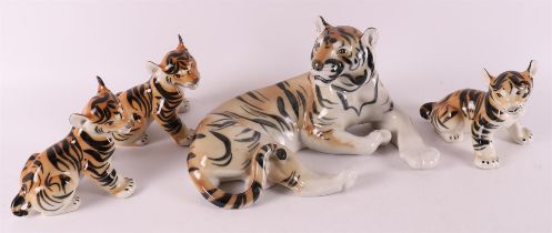 Four polychrome porcelain tigers, made in USSR, 1950s/60s.