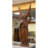 A carved wooden angel Gabriel, 20th century.