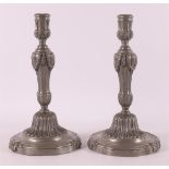 A pair of plain pewter one-light candlesticks, Louis XVI style, 19th century.