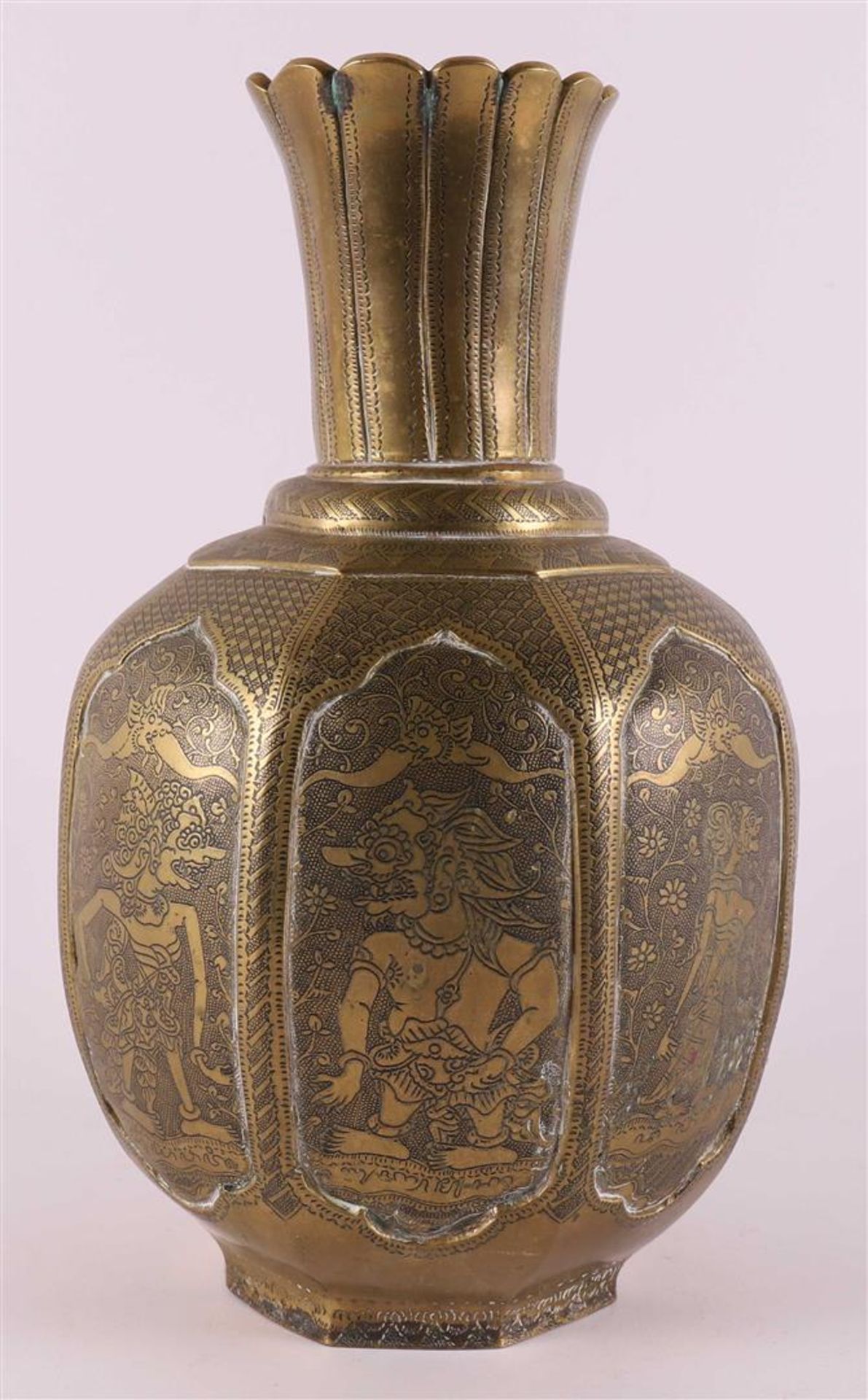 A brass baluster-shaped vase, India, 1st half of the 20th century.