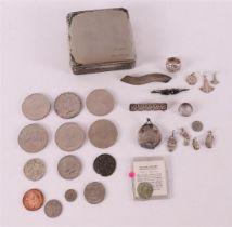 A lot of silver jewelry and various coins including base.