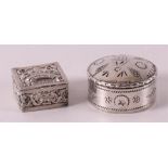 A round silver pill box + smaller one with cardinal's crown, 20th century.