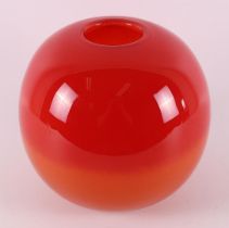 A spherical red and orange glass vase, Belgium, design: Henry Dean.