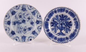 Two earthenware plates with a so-called 'Chinoiserie decor'. Delft