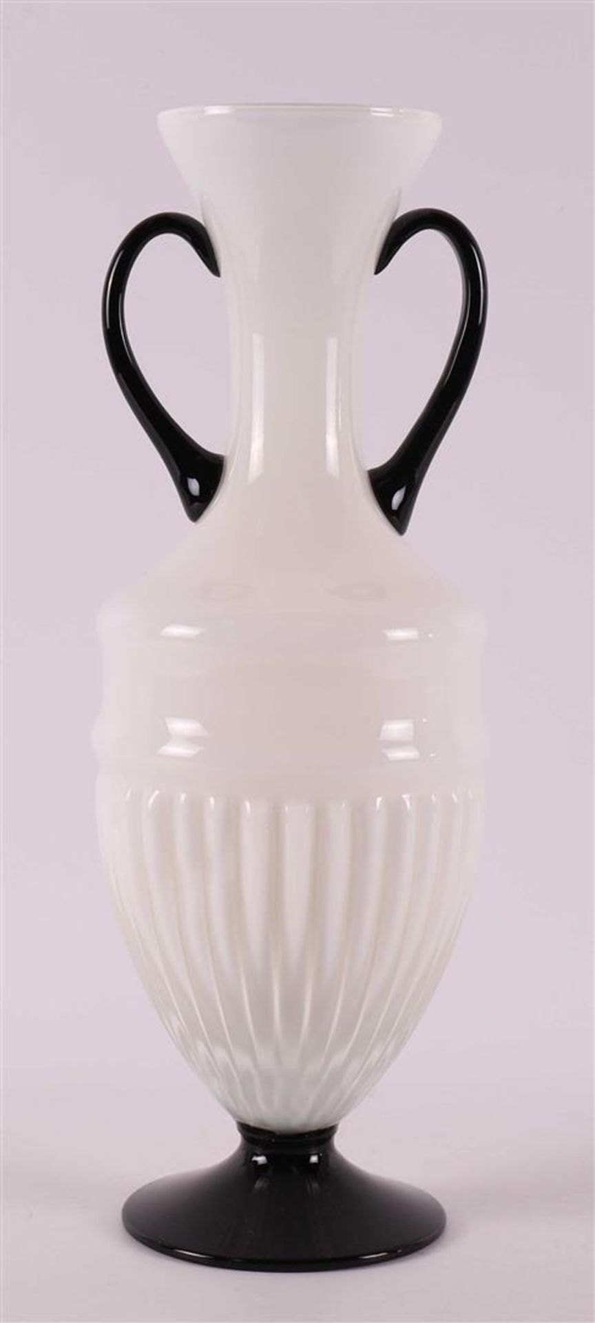 A white glass Art Deco vase with black glass handles and base, France, ca. 1920