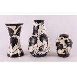 Three black and white earthenware vases, decor 'Fariet', ca. 1930.