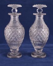 A pair of baluster-shaped cut crystal decanters, 1st half 19th century.