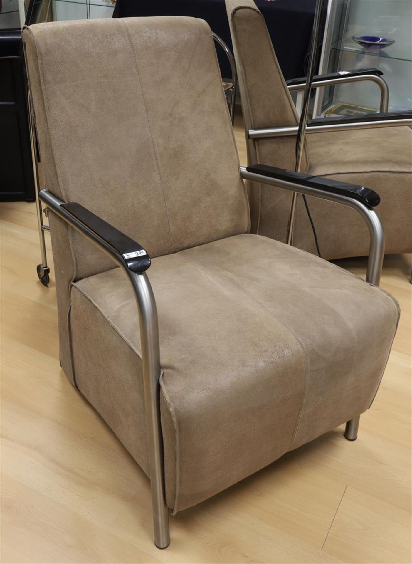 A set of beige suede armchair with chrome metal backrest, 21st century