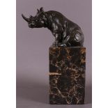 A brown patinated bronze sitting hippopotamus, after an antique example, 21st ce